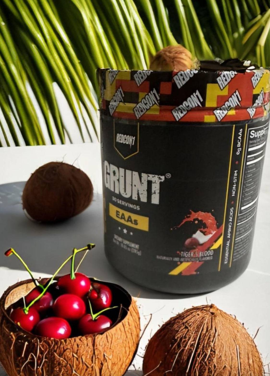 a can of coconut and some cherries on a table